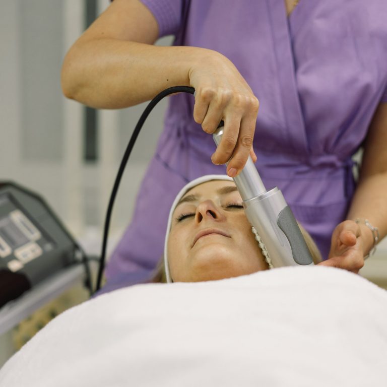 female-beautician-makes-a-facial-massage-with-a-sp-2026-01-05-05-43-48-utc